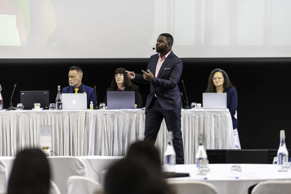 Andrew Tsuro presenting to an international leadership audience