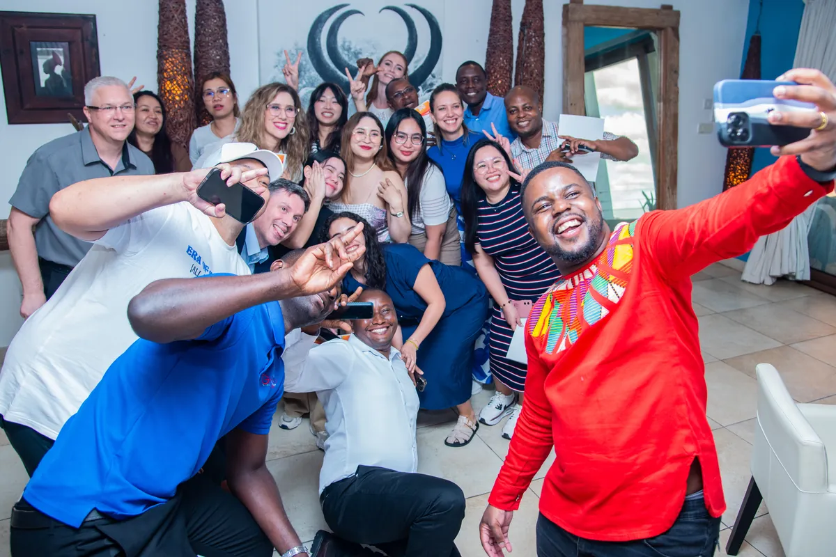 Andrew Tsuro with participants after a team-development session